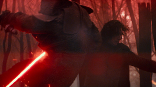 New <i>Star Wars: The Rise of Skywalker</i> Footage Featured Rey in a Black Hood With a Dual Red Lightsaber